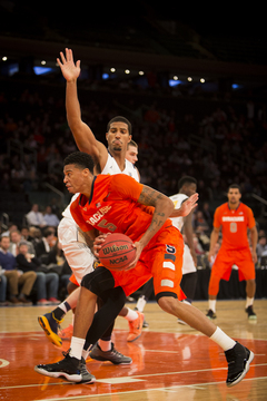 McCullough takes the ball to the basket against a Cal defender on Thursday night.