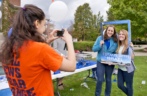 (From left) Ari Pressman, Ilana Siegal and Sarah Schugel participate in one of Wednesday's activities on the Quad hosted by Syracuse Students Stand With Israel. Wednesday was the group's first event.
