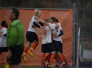 Syracuse celebrates after sophomore Oyvind Alseth's goal gave the Orange a 2-1 lead, which it wouldn't relinquish in its victory over Penn State on Sunday.