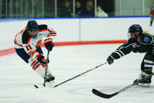 Forward Emily Costales takes control of the puck in the Tennity Ice Pavilion last season. The facility is not suitable for the Division 1 team.