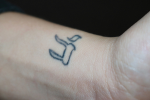 Junior Marnie Landau got a Hebrew symbol on her wrist to honor life. 