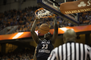 North Florida's Romelo Banks stuffs in a dunk. He grabbed a game-high eight offensive rebounds for the Ospreys.