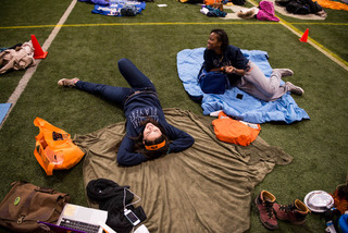 Allie Villa, a senior public relations and Spanish major, and Quinntassia Worrell, a sophomore in the College of Arts & Sciences, wait for fellow members of First Year Players to arrive at the Carrier Dome. 