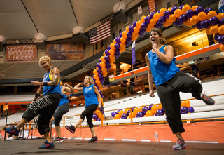 Kat Bombard, center, with members of Dancing Cats at Pacific Health Club, MJ Morales, Jo Sweredoski and Lu Phillips, lead a Zumba class for Relay for Life attendees. Almost 100 people joined in for the upbeat dance workout. 
