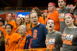 Chancellor Kent Syverud and his wife Ruth Chen sing the Alma Mater with BBB residents during the annual Home to the Dome event on August 21, 2014.