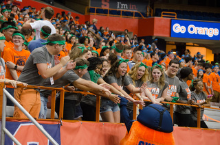 Freshmen greet Otto the Orange during the annual Home to the Dome event on August 21, 2014.