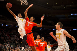 McCullough goes up for a block. He led Syracuse with four of those on Thursday night. 