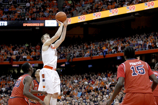 Trevor Cooney takes a shot in the first half. He made only one shot, a pull-up jumper. 