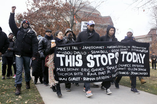 Marchers begin their walk from Hendricks Chapel to Bird Library, where they staged a 