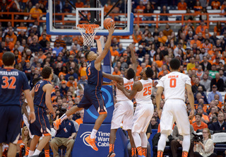 Roberson and Christmas can't stop a Virginia basket in the second half of UVA's win. 