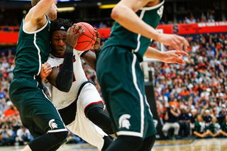 Harrell forces his way through Michigan State's defense late in the second half.