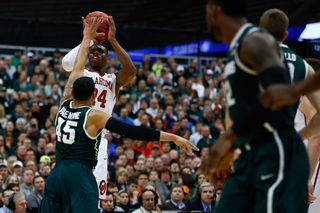 Hield goes up for a jump shot, but is blocked by MSU's Denzel Valentine (45).