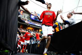 Louisville's Anas Mahmoud runs out to the court moments before the start of Louisville and Michigan State's battle for the Final Four in the Carrier Dome.