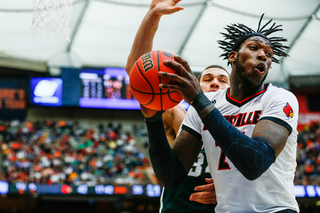 Louisville's Montrezl Harrell goes for a rebound in the paint.