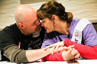 Greg Childers and Shelly Revette comfort each other during Relay For Life, an annual event held to raise money and awareness for cancer research, as well as to honor those affected by cancer.