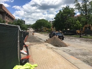 The asphalt and a majority of the sidewalk along University Place have been torn up as part of the construction for the promenade. Photo taken June 8, 2016