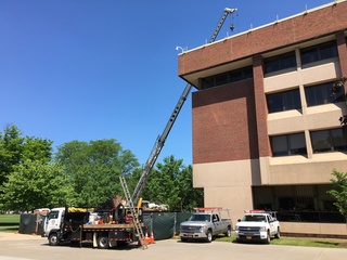 Construction equipment and vehicles have been stationed by academic buildings, such as Link Hall. Photo taken June 1, 2016
